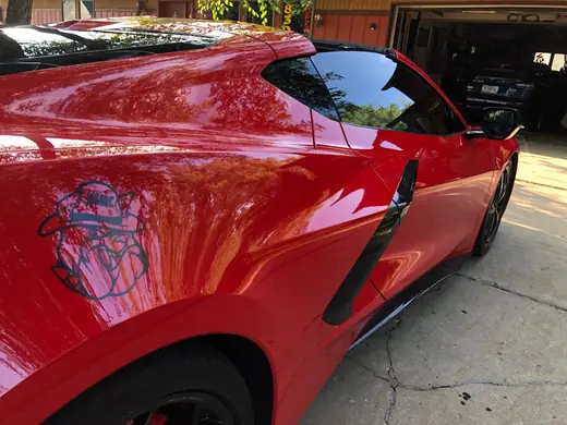 Red sports car with side graphics